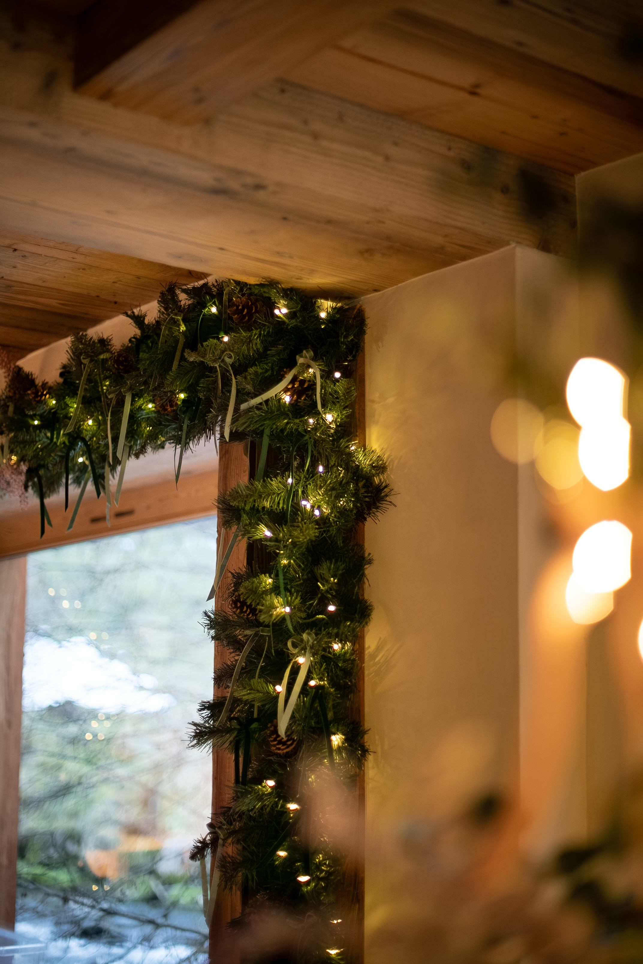 Garland through a candlelit doorway