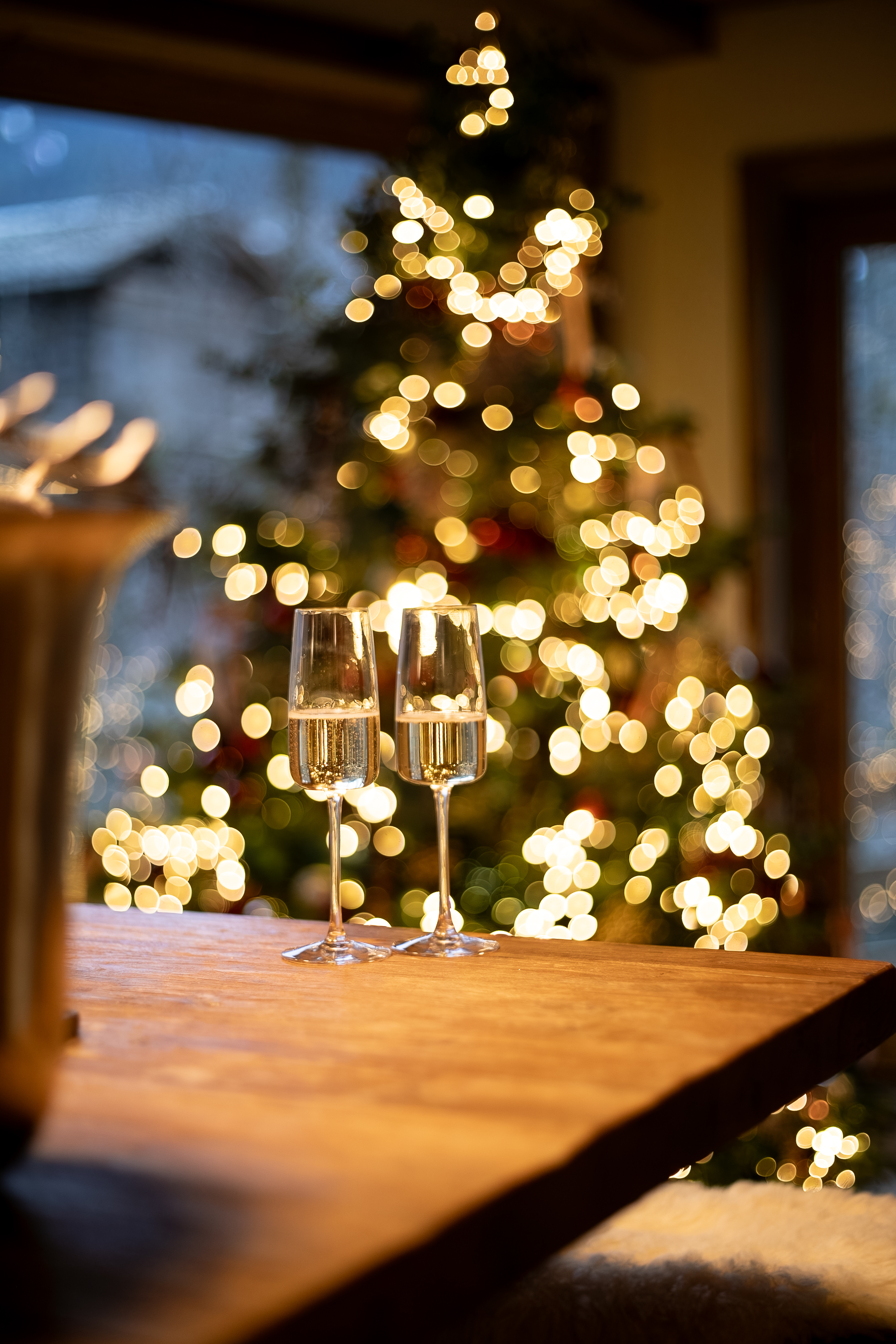 Champagne by the tree on Christmas Eve