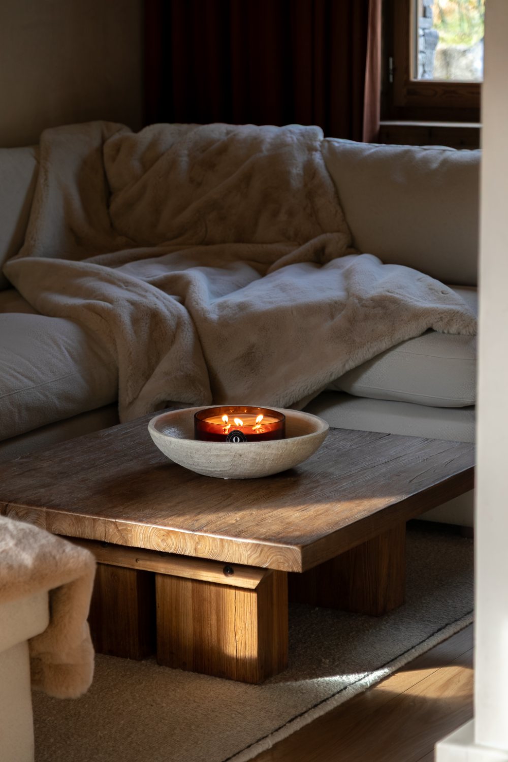 Candlelit snug with fur throws