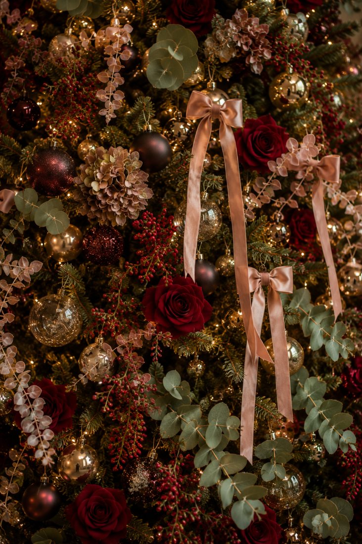 Christmas in Bloom — preserved roses and eucalyptus through the tree